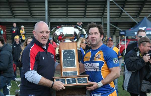 President Rugby Ontario David Nelson presents Cup to Capt Haydn Gage Paul Calandra, Member of the Canadian Parliament for Oak Ridges